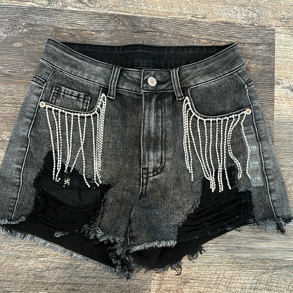 Distressed shorts with rhinestone fringe